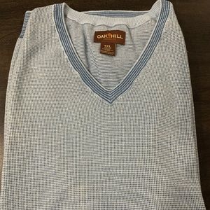 V-Neck sleeveless sweater. Blue and white